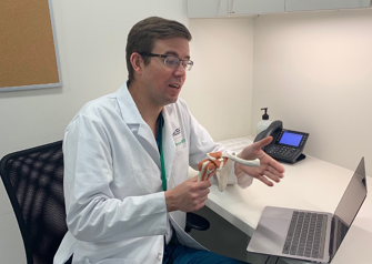 Dr. Grant Garrigues conducting a telemedicine visit