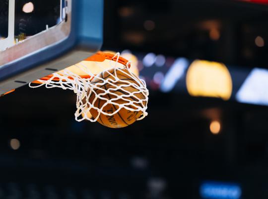basketball goes through hoop