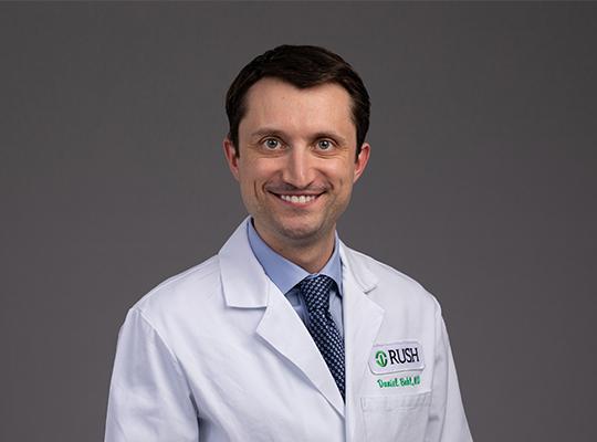 Dr. Daniel Bohl in whitecoat